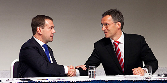 Stoltenberg and Medvedjev shake hands