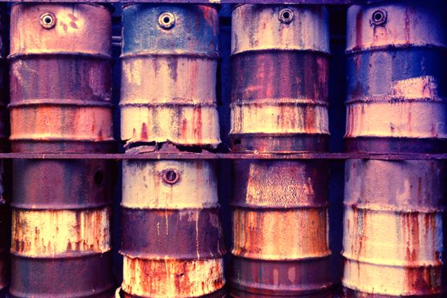 rusted old oil barrels