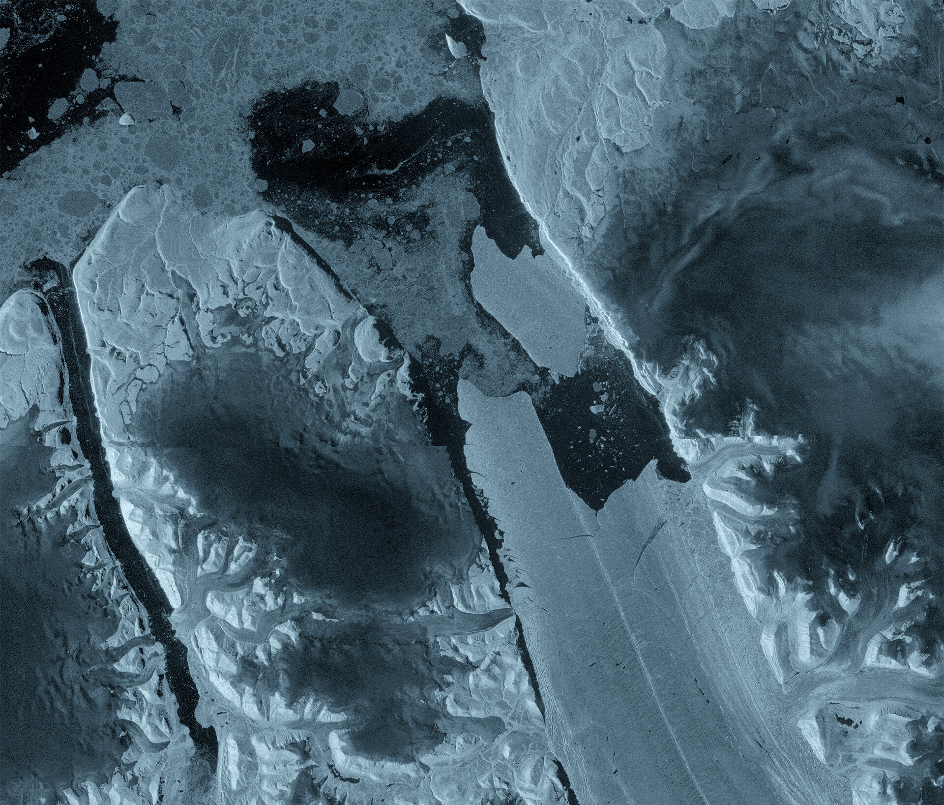 Petermann Glacier calves huge iceberg pillars 2