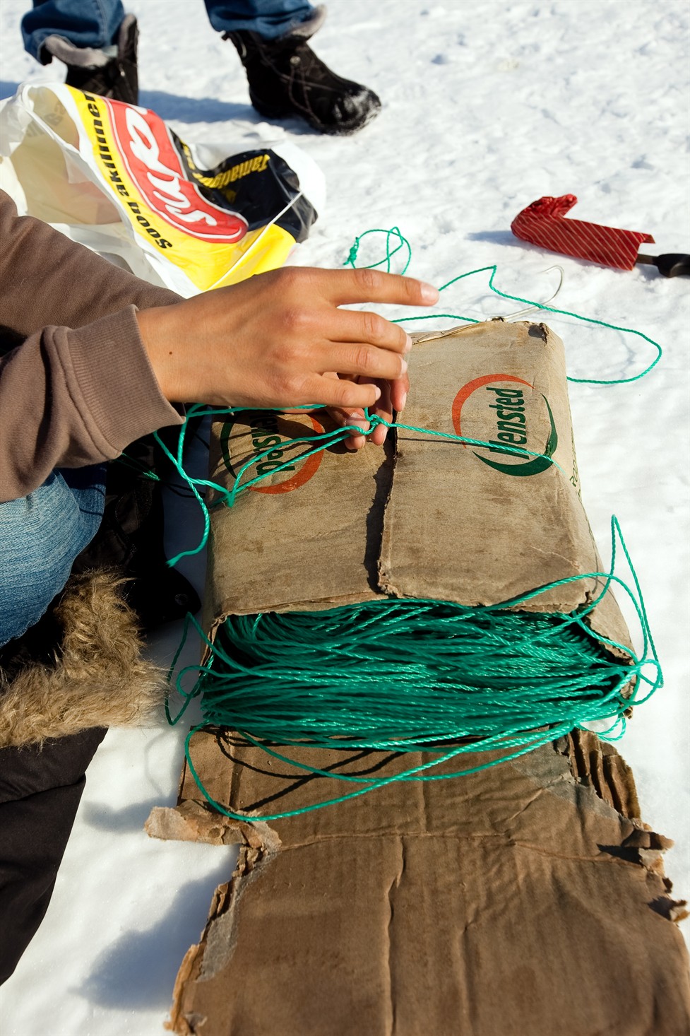 Preparations for ice fishing in Uummannaq, Greenland