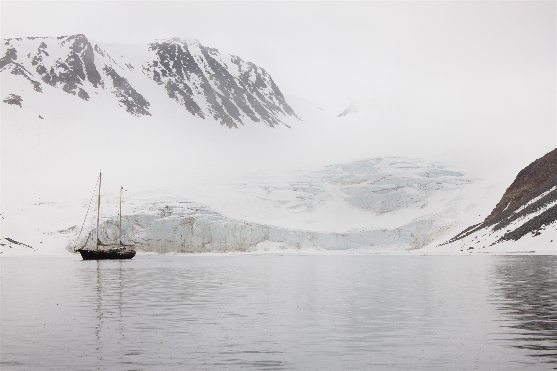 Private yacht in polar waters, near Svalbard
